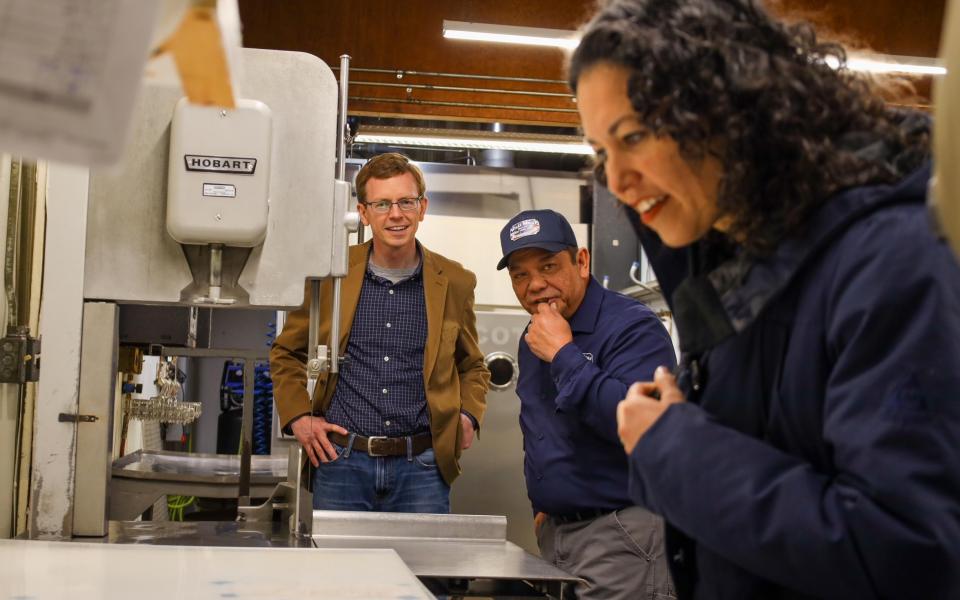 Rep. Johnson, Wall Meats Owner Ken Charfauros, and Under Secretary Xochitl Torres Small at Wall Meats 