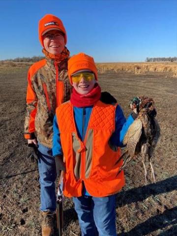 Dusty and son Ben pheasant hunting 