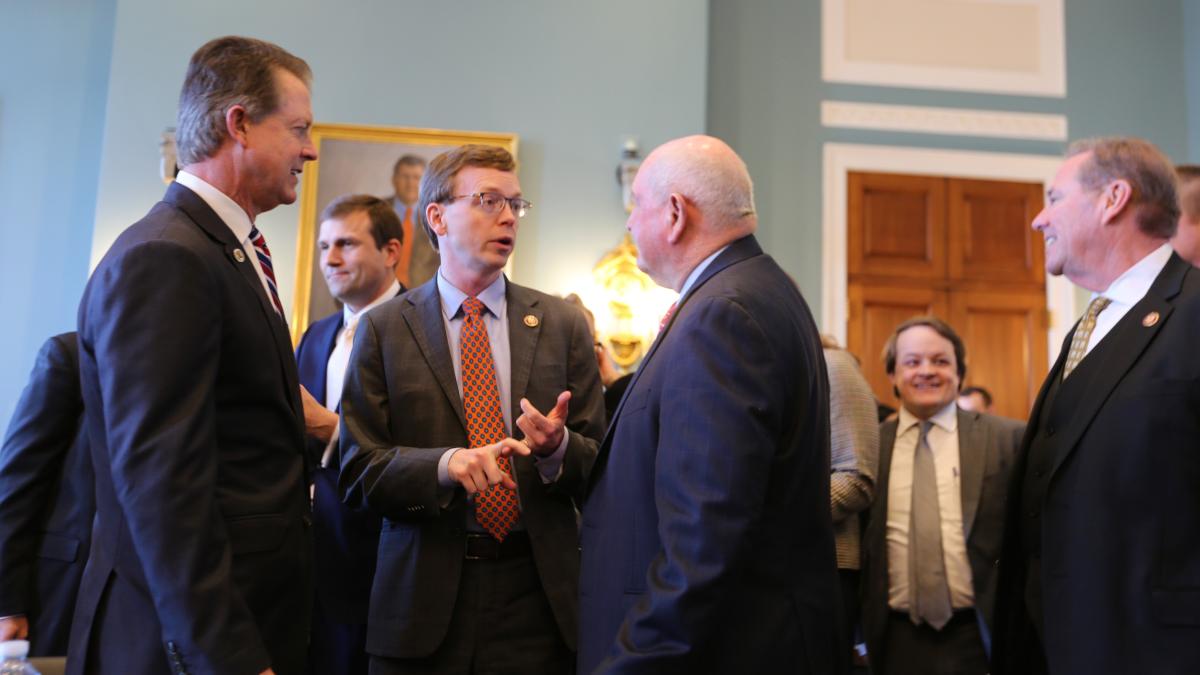 Johnson talking with Ag Secretary